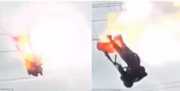 Female Military Parachutist Suffers Electric Shock After Crashing Into Power Lines {See Pure Photos}